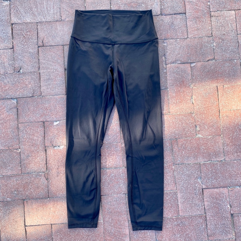 Black Lululemon Wunder Train High-Rise Tight 25" size 6
